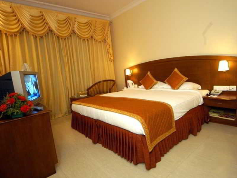 Aj International Hotel Bangalore Kamer foto